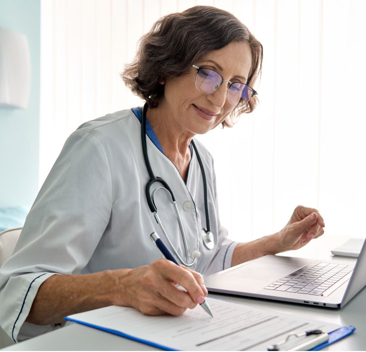 Healthcare provider filling out a form