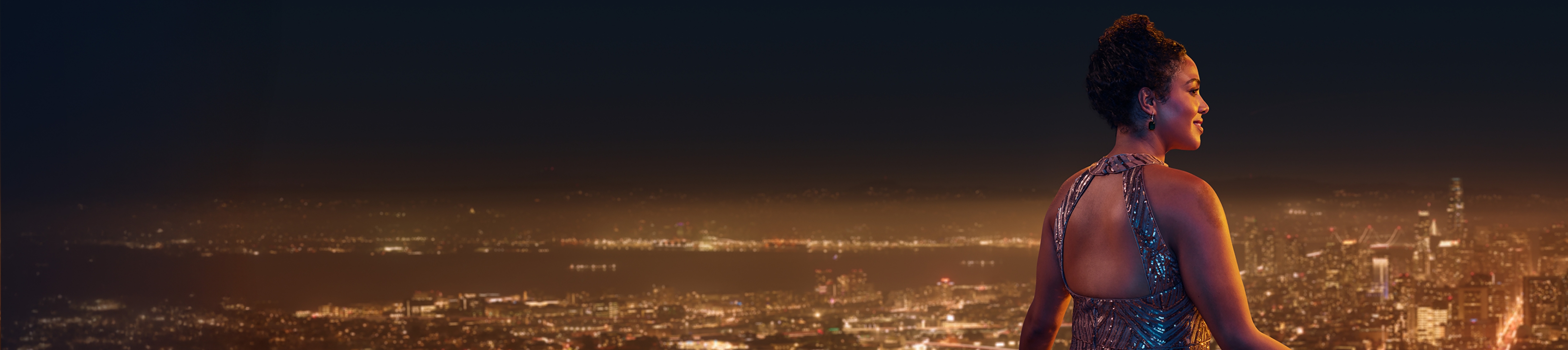 Woman overlooking city
